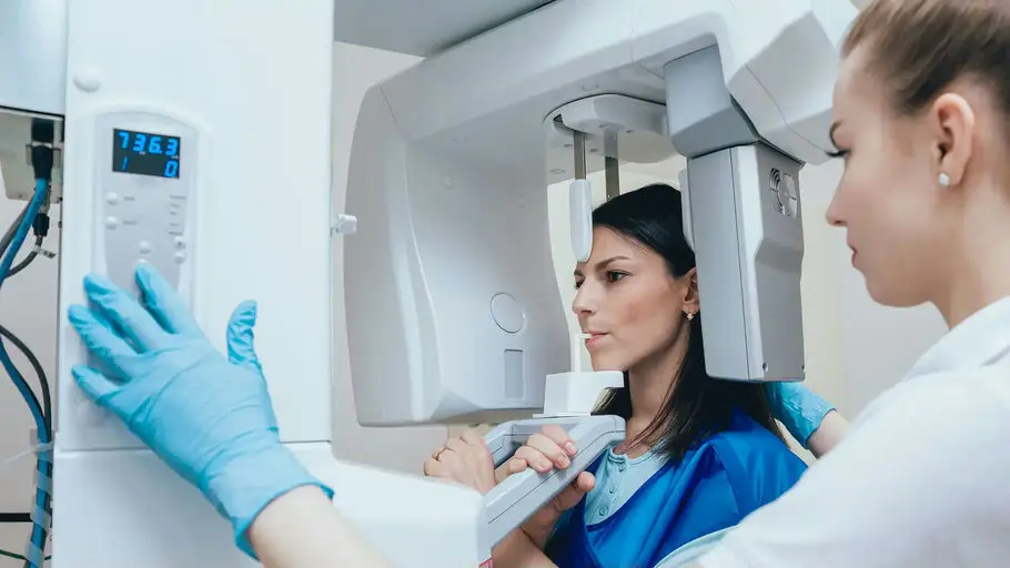 Dentist explaining a dental X-ray